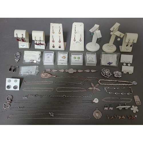 107 - A collection of mainly silver jewellery to include earrings, pendants, bracelets, chains, etc