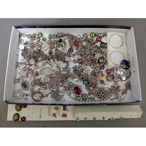 108 - A collection of silver and white metal jewellery to include earrings, pendants, chains, bracelets, c... 