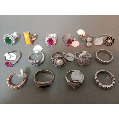 117 - A collection of 15 silver rings, various settings, marked 925.