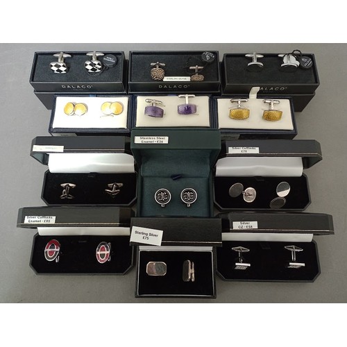 123 - A collection of cuff-links to include silver, stainless steel, enameled, etc, all with associated bo... 