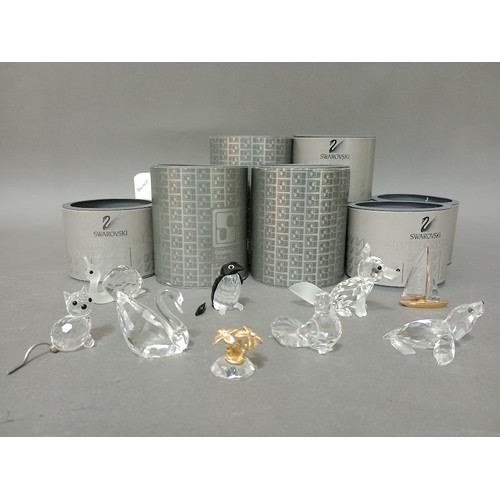 147 - Nine Swarovski crystal ornaments, all with boxes.