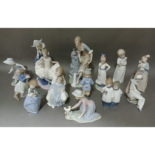 155 - A collection of thirteen Nao figures