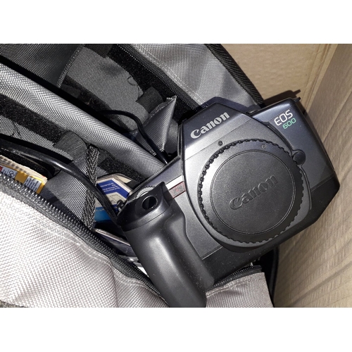 324 - A Canon EOS 600 camera body with accessories.