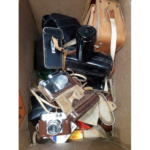 327 - A box of assorted cameras and accessories including a Contax, a Kueb, a Voigtlander VITO B etc.