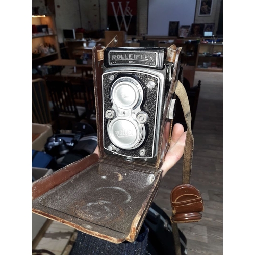 329 - A Rolleiflex medium format camera.