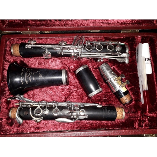 278 - A Rudall Carte Super Graduate clarinet in hard case.