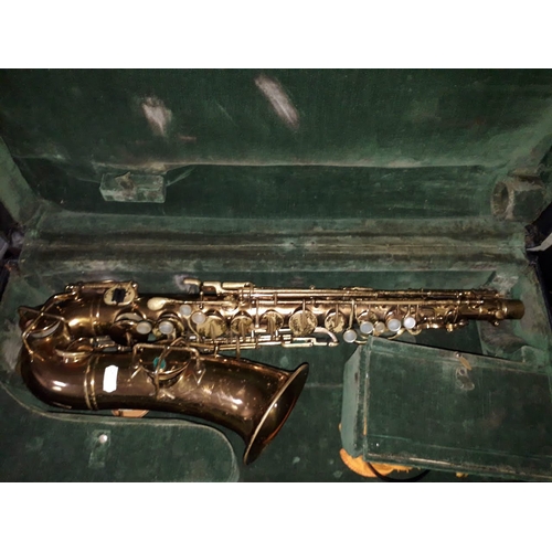 281 - A Buescher alto saxophone with hard case.