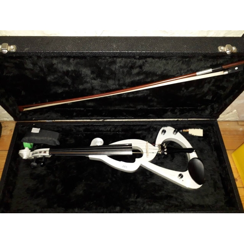 285 - A cased silver coloured electric violin with bow.