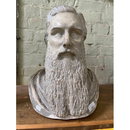 162 - A painted plaster bust of a gentleman.