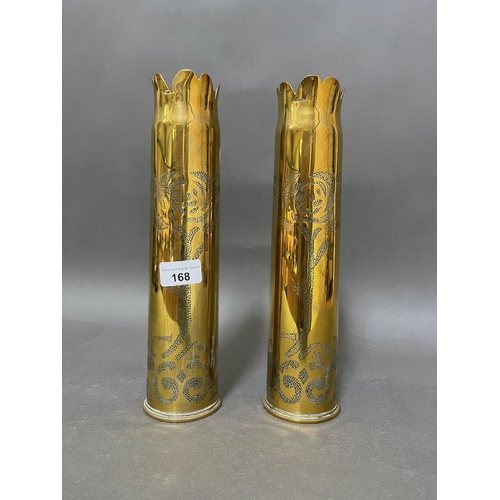 168 - A pair of WW1 trench art brass shells.