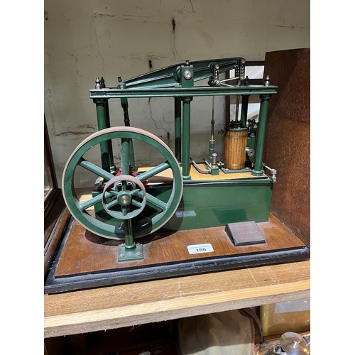 180 - A well engineered scale model of a six column rotative beam engine, on wooden base and plinth, total... 