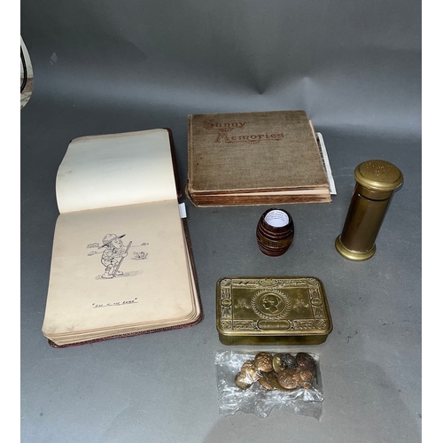 202 - A collection of WWI era items including brass Christmas box 1914, 10 military buttons, brass post bo... 