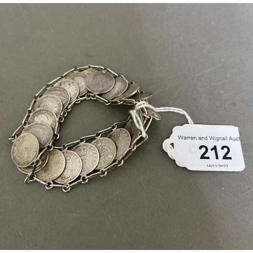 212 - A silver 3d coin bracelet.