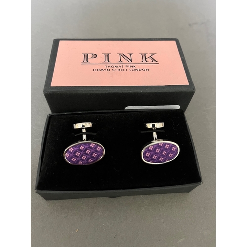 213 - A pair of Thomas Pink cuff-links.