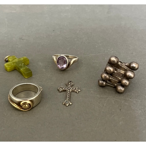 232 - Three silver rings and a marcasite crucifix.