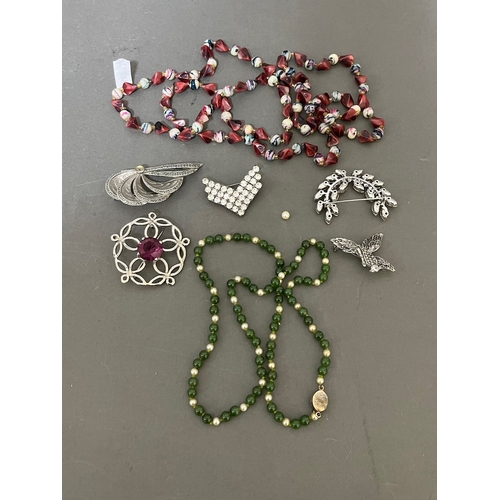 235 - Assorted costume jewellery including a jade and simulated pearl necklace, marcasite brooches, etc.