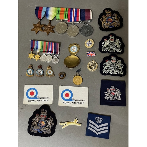 266 - Military interest - a mixed lot of medals, badges and cloth patches to include a medal awarded to 40... 