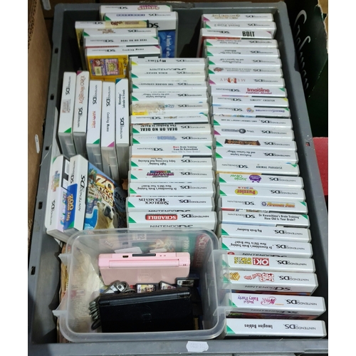 350 - 2 Nintendo DS game consoles with approx 68 various games.