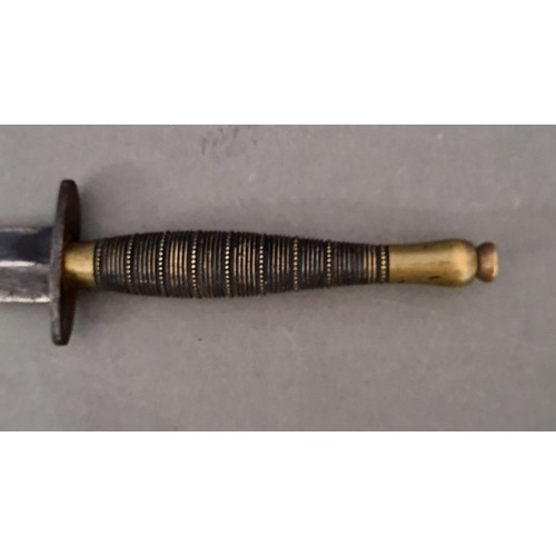 96 - Military interest - a WW2 Fairbairn-Sykes commando fighting knife / dagger, double-edged, with brass... 