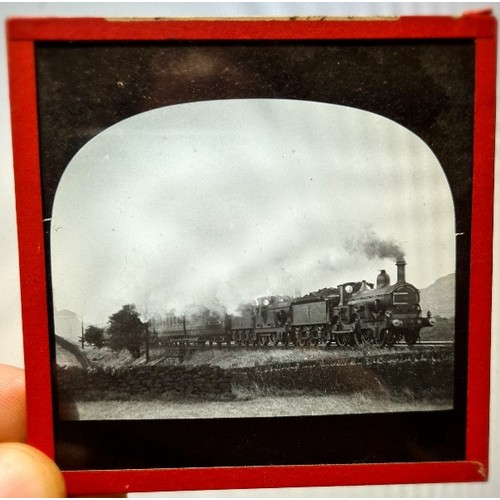 193 - A case containing approx. 200+ early 20th century magic lantern type slides.