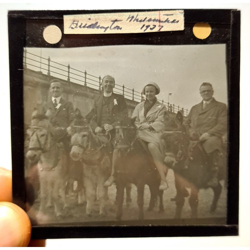 193 - A case containing approx. 200+ early 20th century magic lantern type slides.