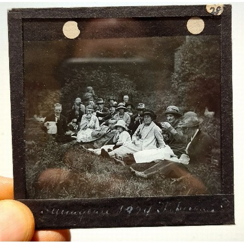 193 - A case containing approx. 200+ early 20th century magic lantern type slides.