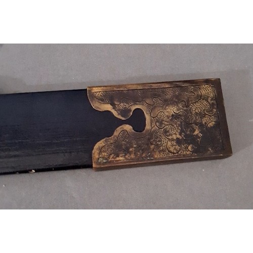 14 - A Chinese sword, double fullered and etched blade, brass mounted wooden handle and scabbard, total l... 