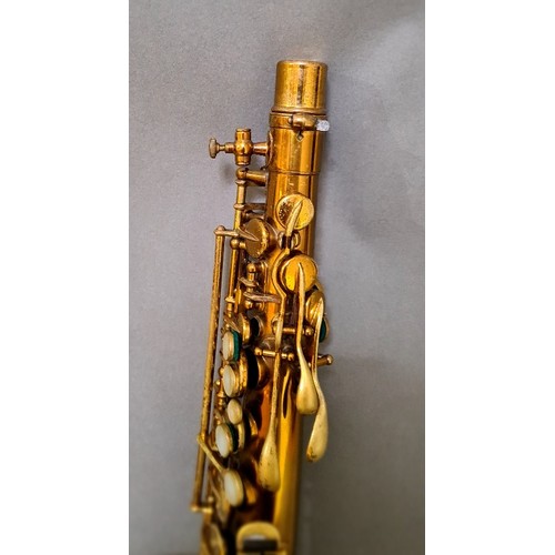 281 - A Buescher alto saxophone with hard case.