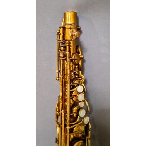 281 - A Buescher alto saxophone with hard case.