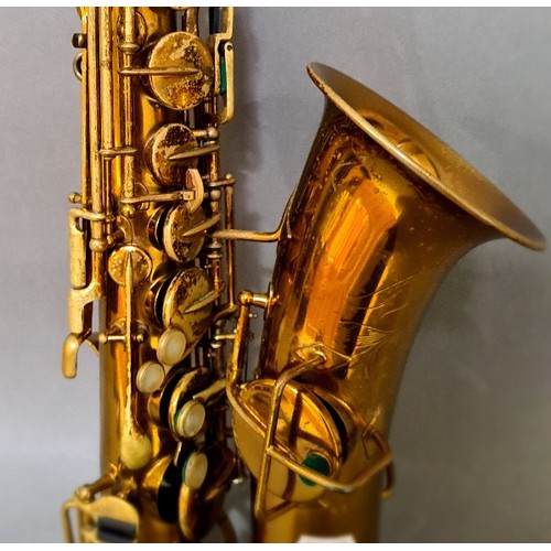 281 - A Buescher alto saxophone with hard case.