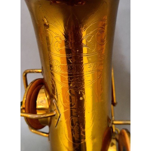 281 - A Buescher alto saxophone with hard case.