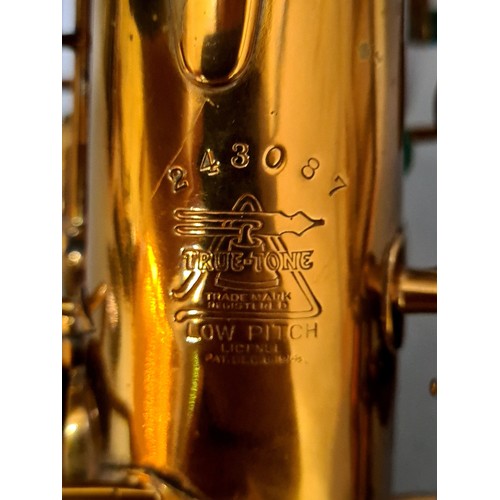 281 - A Buescher alto saxophone with hard case.