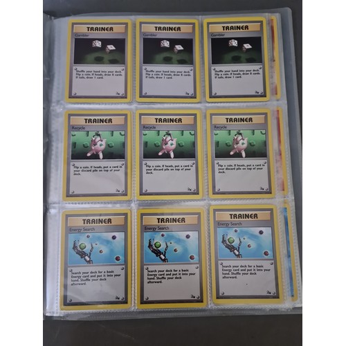 340 - A box containing two binders of vintage 1990s Pokemon cards together with a vintage Pokemon marble b... 