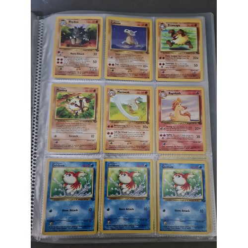 340 - A box containing two binders of vintage 1990s Pokemon cards together with a vintage Pokemon marble b... 