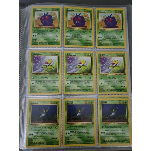 340 - A box containing two binders of vintage 1990s Pokemon cards together with a vintage Pokemon marble b... 