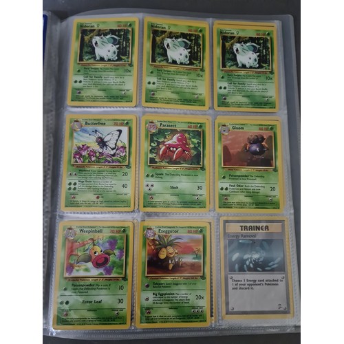 340 - A box containing two binders of vintage 1990s Pokemon cards together with a vintage Pokemon marble b... 