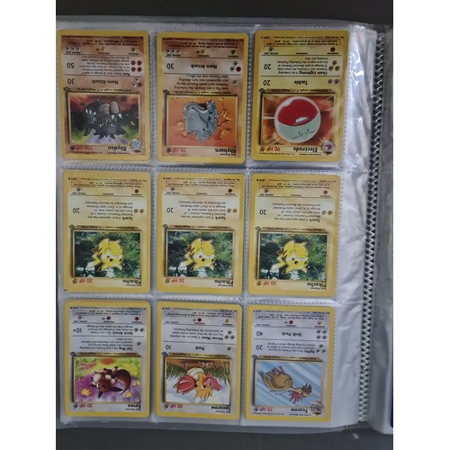 340 - A box containing two binders of vintage 1990s Pokemon cards together with a vintage Pokemon marble b... 