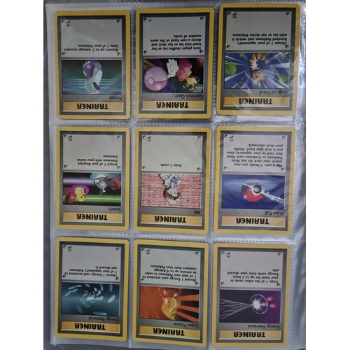 340 - A box containing two binders of vintage 1990s Pokemon cards together with a vintage Pokemon marble b... 