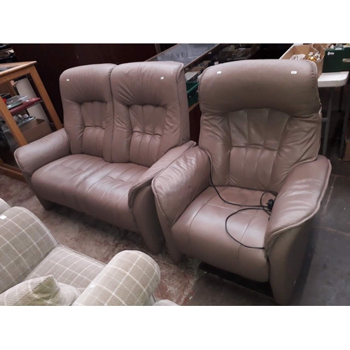 995 - A German Himolla brown leather 2 seater sofa and matching electric recliner armchair.