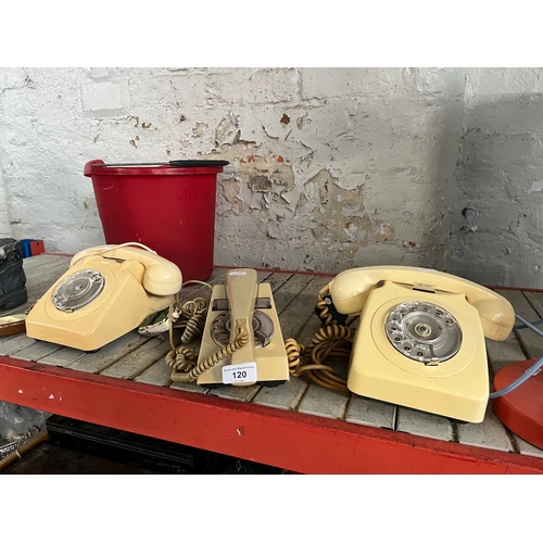 120 - Three vintage twist dial telephones including one budgie phone.