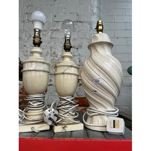 125 - 3 pottery table lamps.