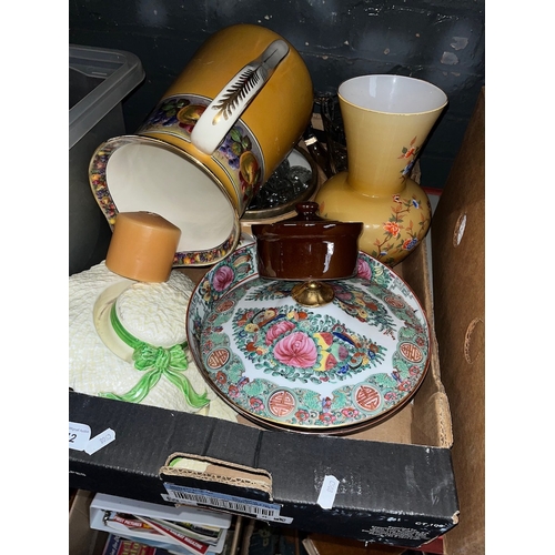 142 - A box of pottery, vases, glassware, etc.