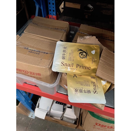 167 - A box of Snail Prime moisturizing replenishment masks.