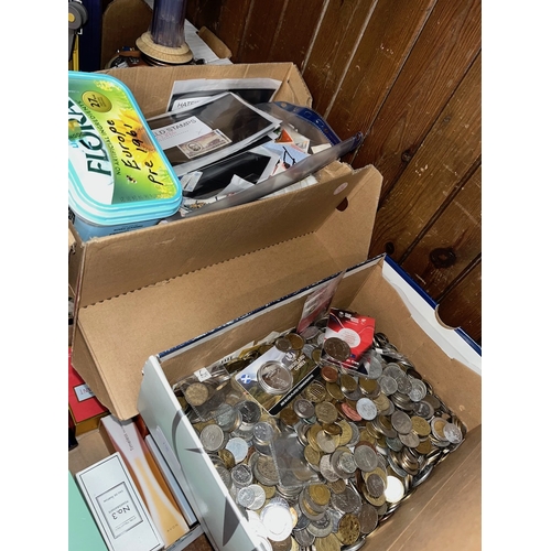 18 - A box of mixed currency coins and a box of assorted stamps