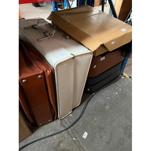 215 - 3 vintage suitcases with selection of vintage clothing to include a dress, various jackets to includ... 