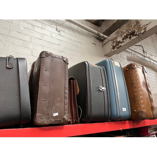 224 - Five vintage suitcases and a Briefcase