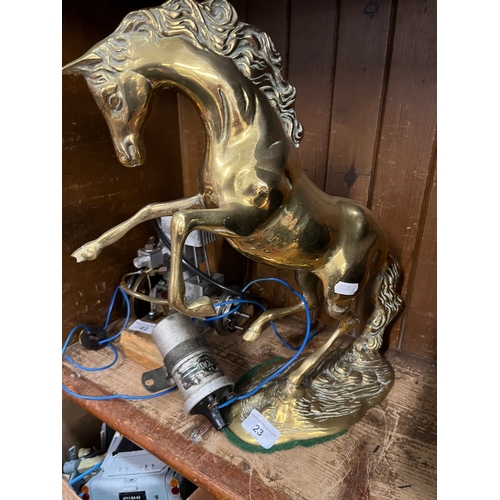 23 - A Brass Prancing Horse Ornament