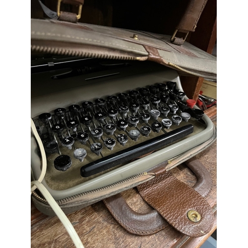 32 - An Olivetti lettera 22 portable typewriter.