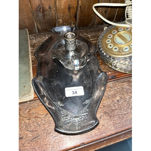 34 - A WMF Art Nouveau silvered pewter chamber stick no. 168 and an Argentor silver plated tray.