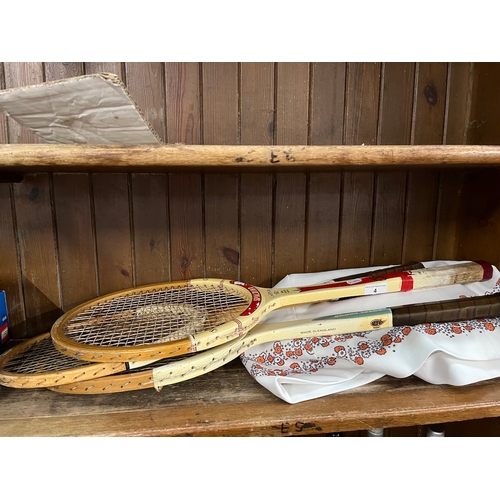 4 - Two vintage tennis outfits size 10 and three vintage rackets.